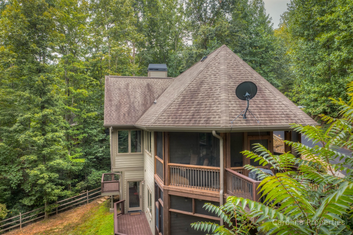 Additional view of the home and screened in area