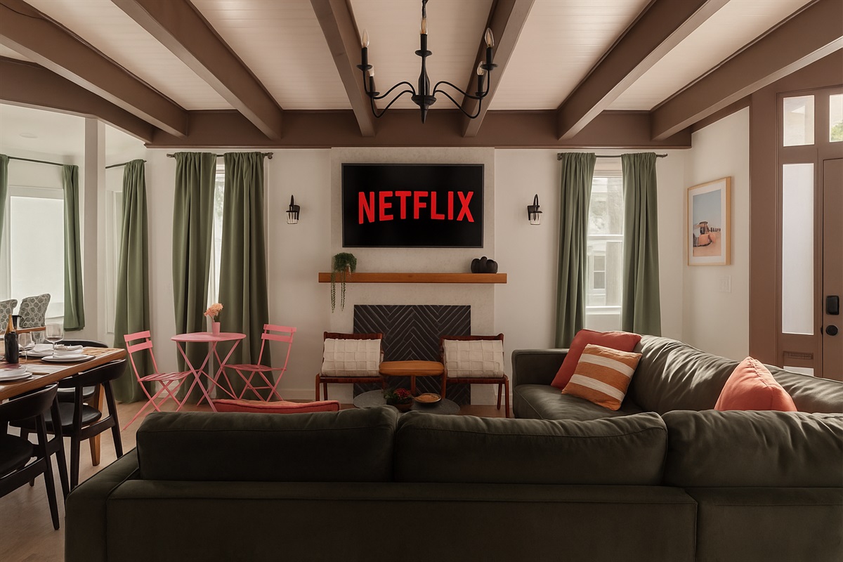 Living Room: Gather around for movie nights or lively chats in this sunlit, stylish space!