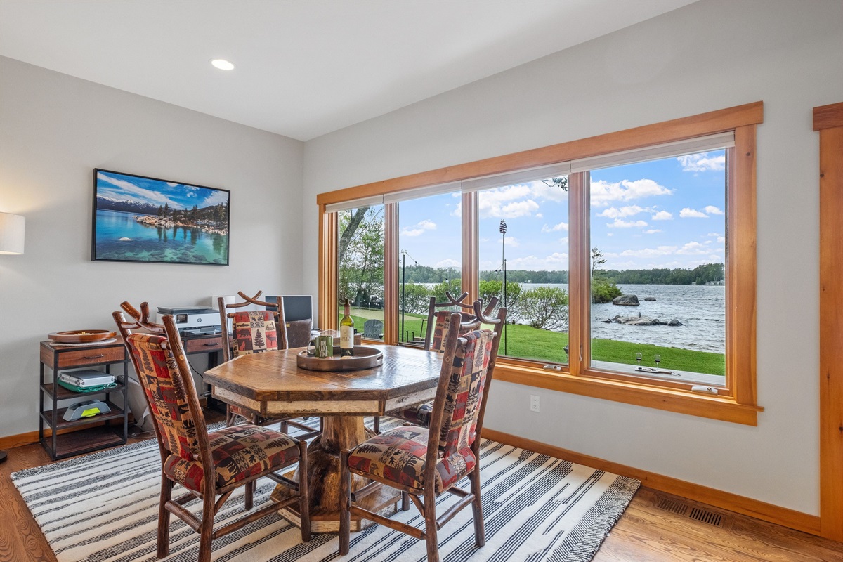 Sunroom overlooking lake and mountain views, great for watching guests on the beach and enjoying the sunsets.