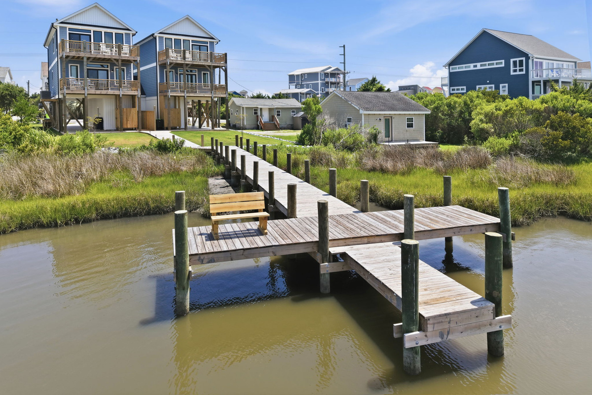 Enjoy direct access to the shared dock for fishing, kayaking, or simply taking in the coastal scenery