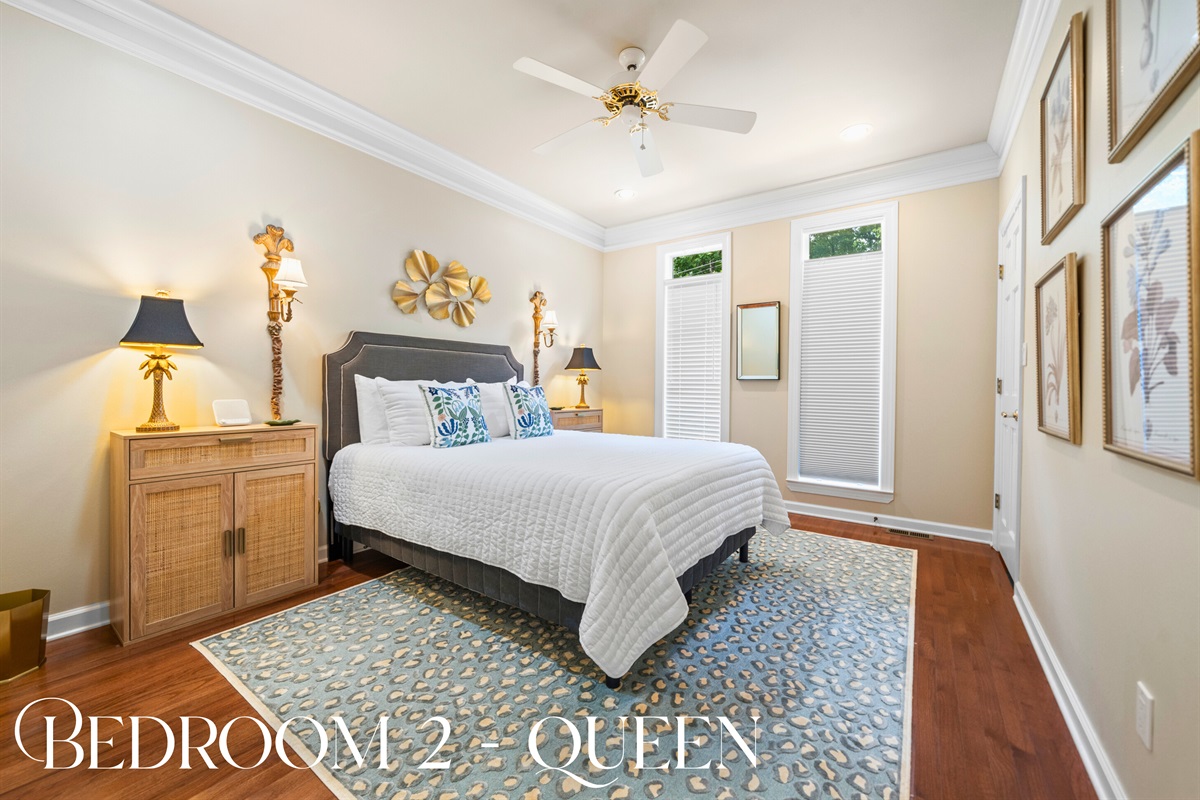 Bedroom 2 (Queen): Cozy and bright with a classic touch &mdash; rest easy here.