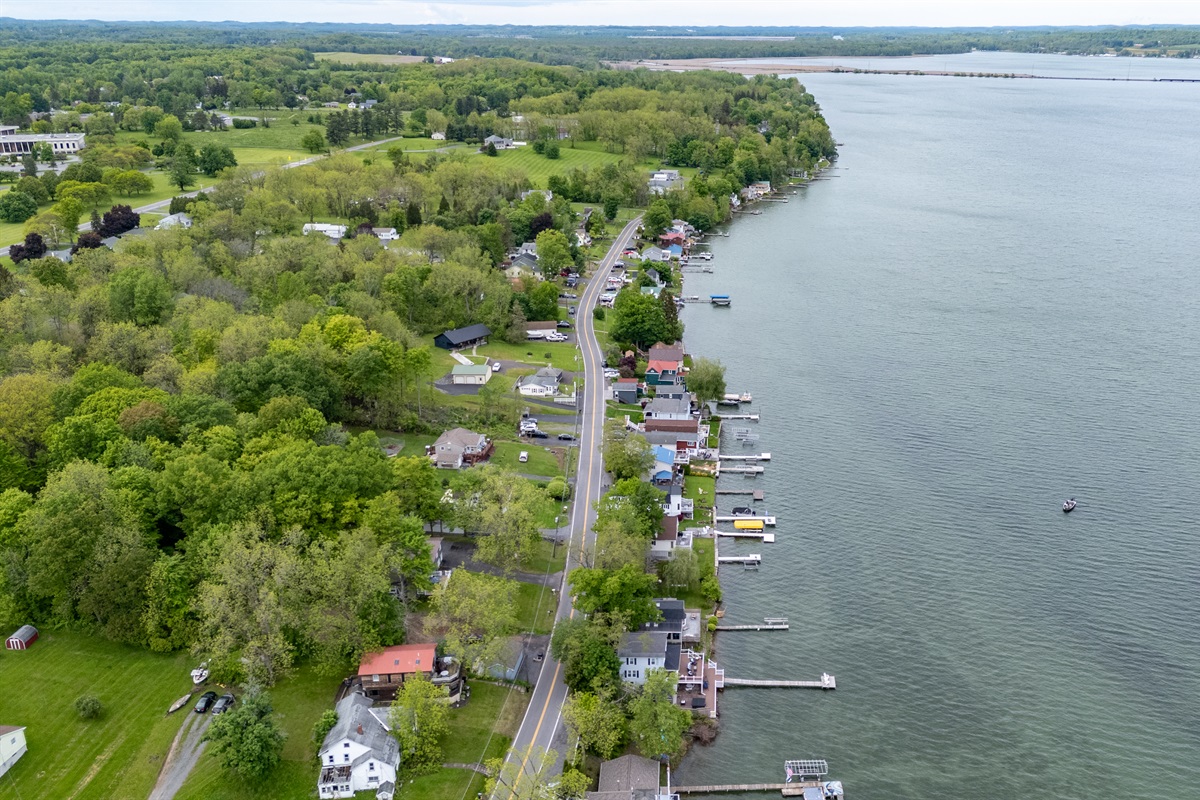 Nestled along a scenic shoreline, this cozy lakefront retreat sits in a charming and peaceful neighborhood 🌳🏘️✨