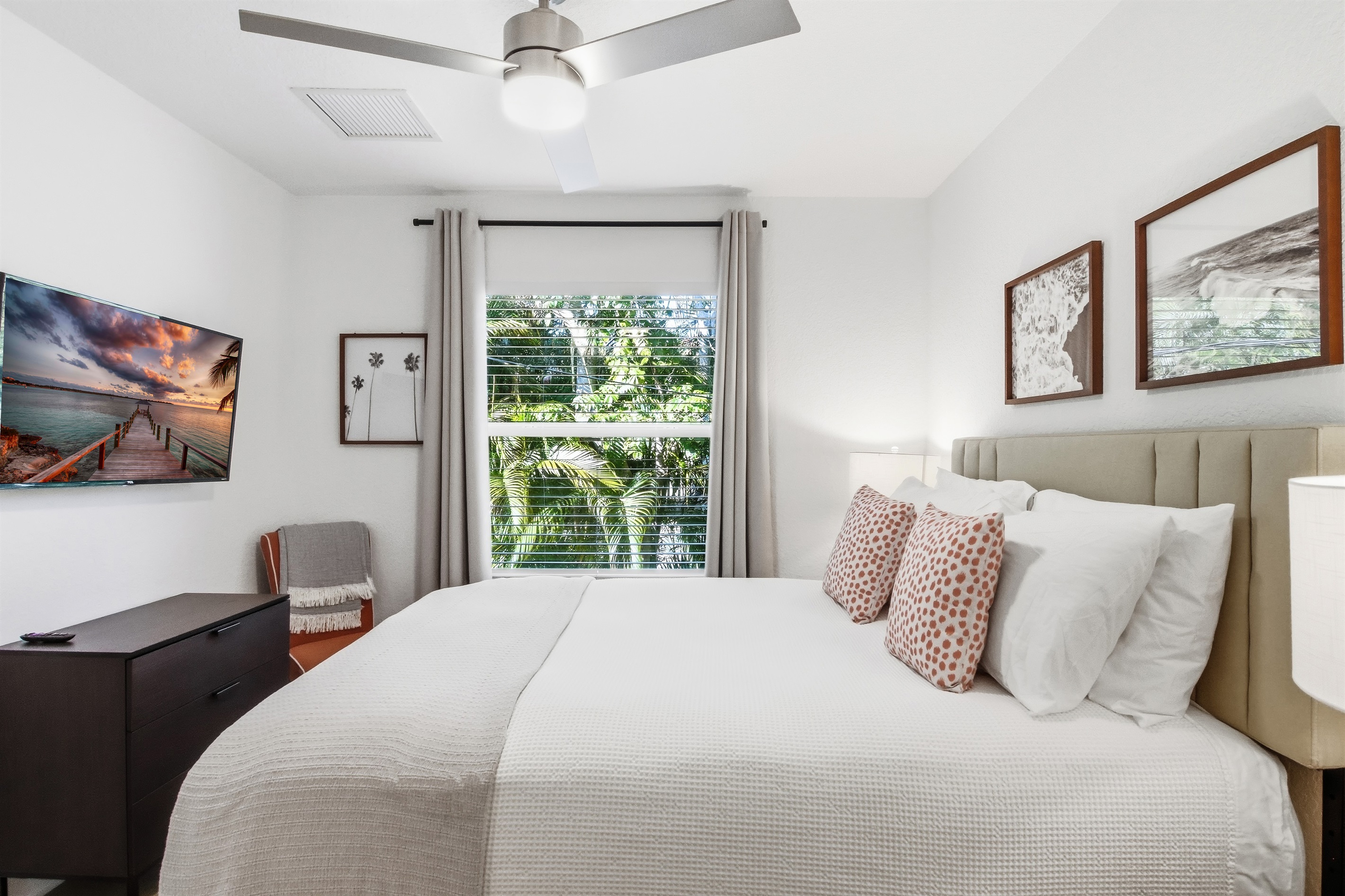 Queen guest bedroom, second floor, plush mattress, room darkening curtains, smart TV, closet with hangers. 