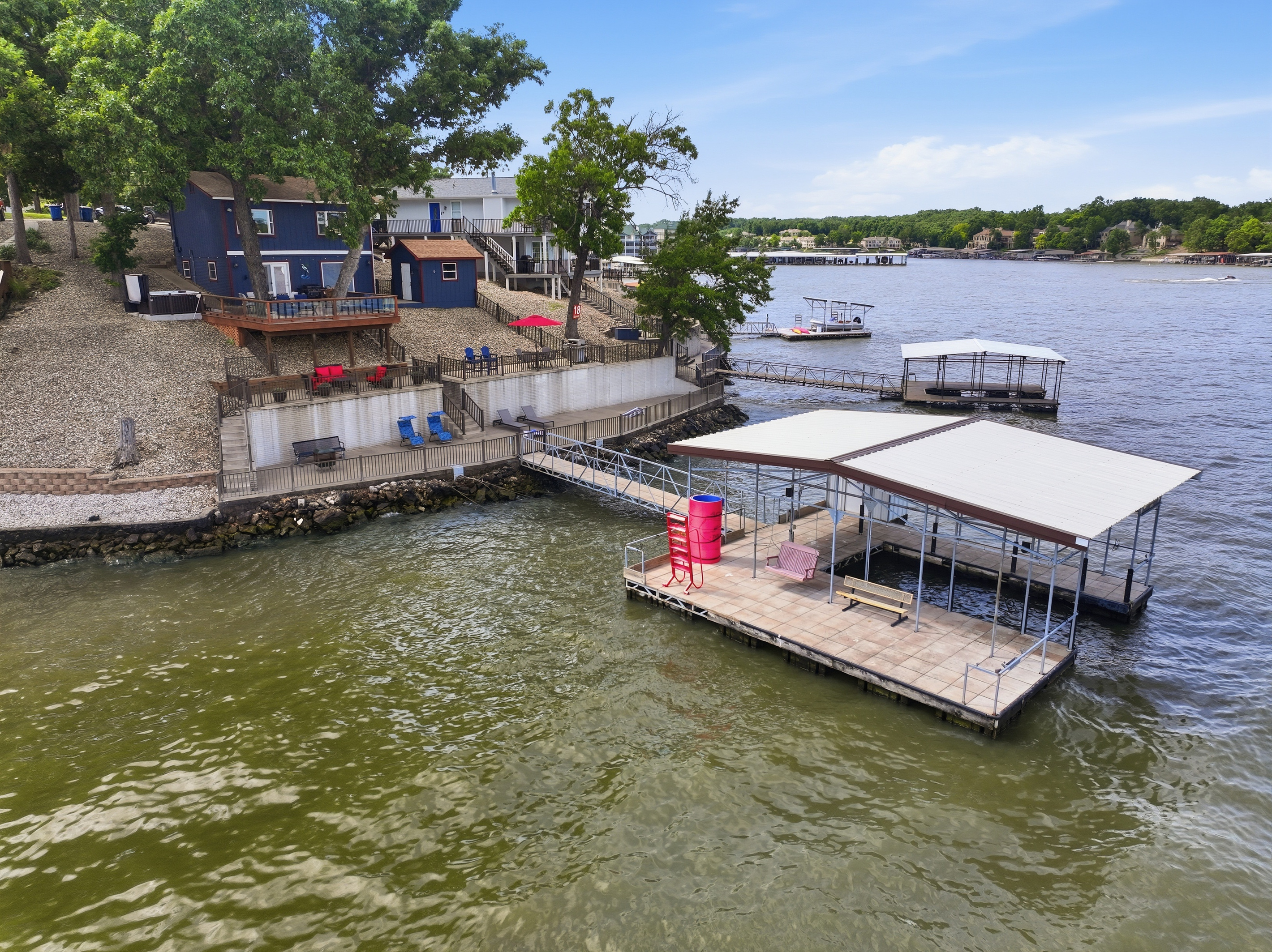 Private dock with boat slip for swimming, fishing, or water taxi pickup