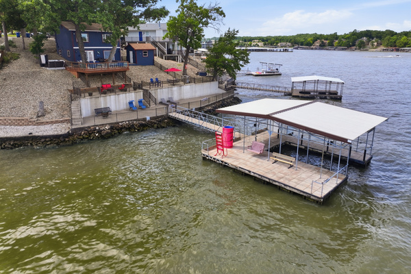 Private dock with boat slip for swimming, fishing, or water taxi pickup