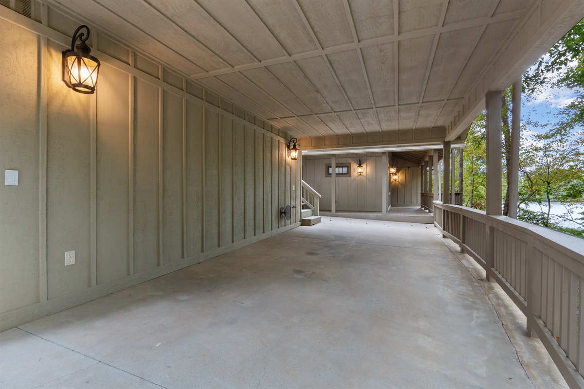 The property offers covered parking and a well-lit path, ensuring easy and safe access to the home at any time.