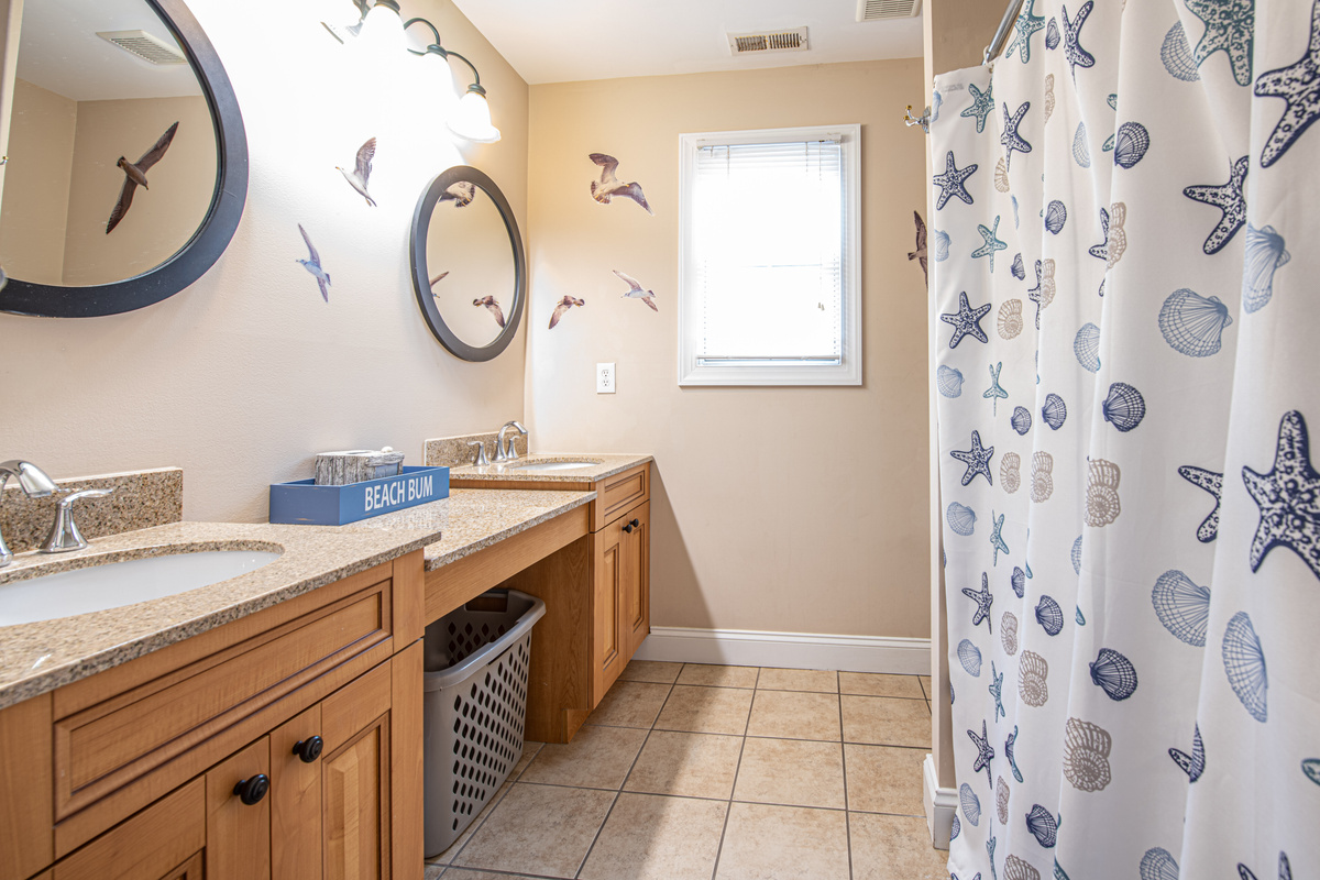 Bathroom 4 with Double Vanity and Coastal Decor