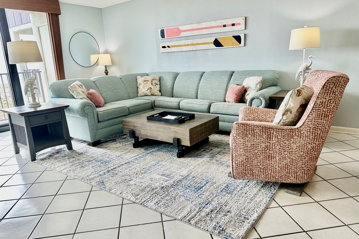 We have a sectional with queen sleeper in the living room!