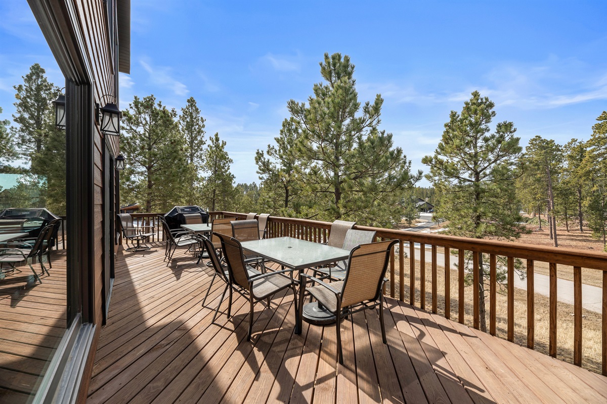 Deck with grill and outdoor seating