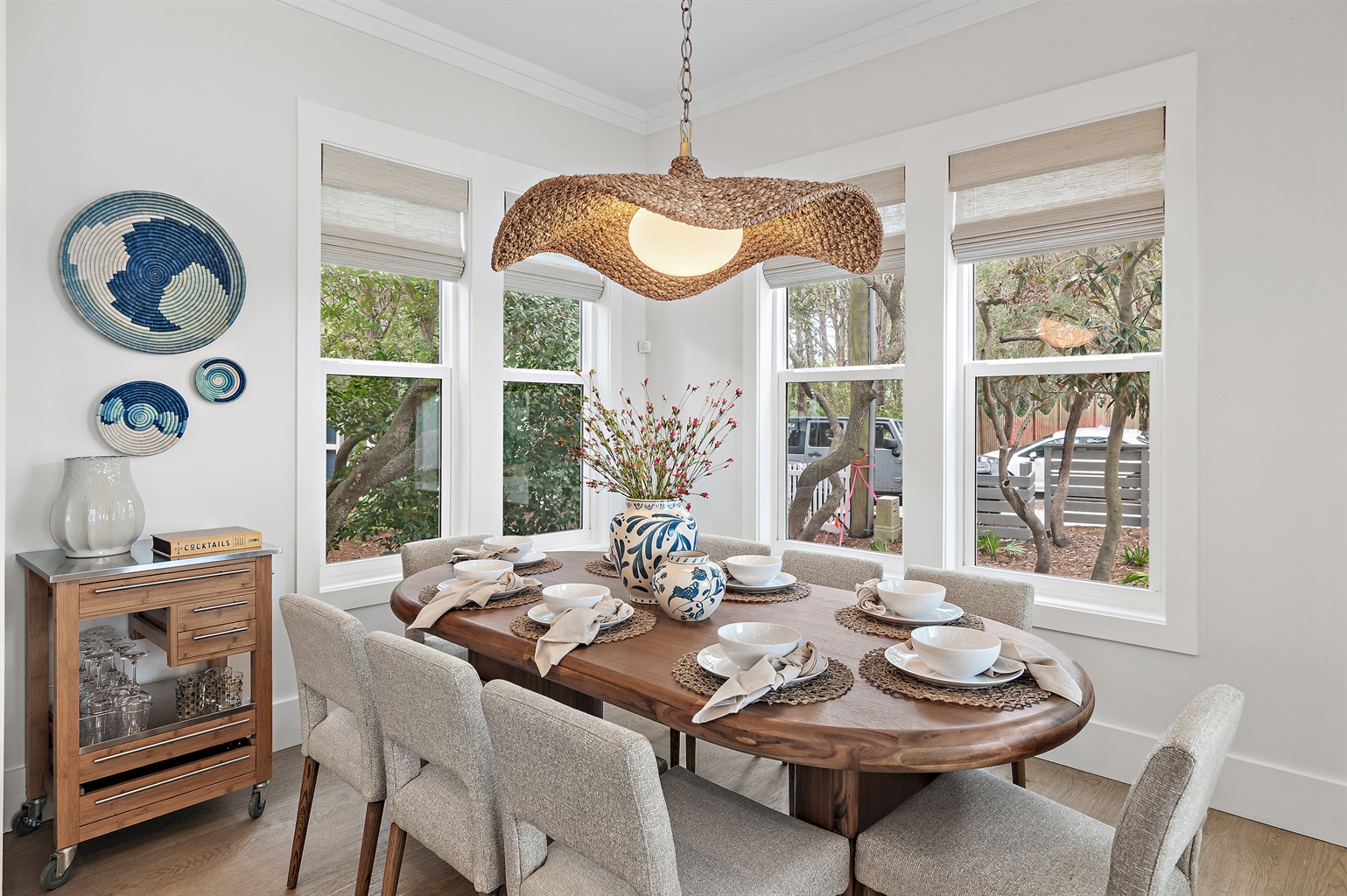 The dining table seats 8, with additional counter space for 4.