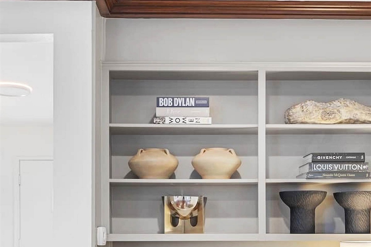 A thoughtfully designed workspace with built-in storage, comfortable seating, and a calm atmosphere perfect for remote work or planning your next adventure. ✨💻