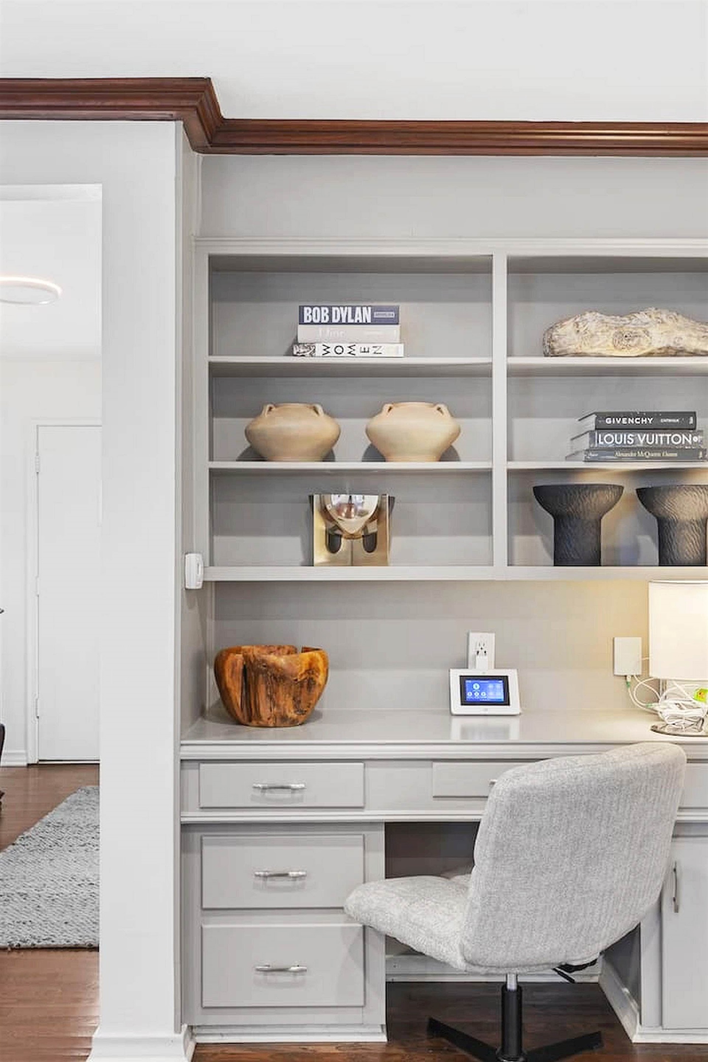 A thoughtfully designed workspace with built-in storage, comfortable seating, and a calm atmosphere perfect for remote work or planning your next adventure. ✨💻