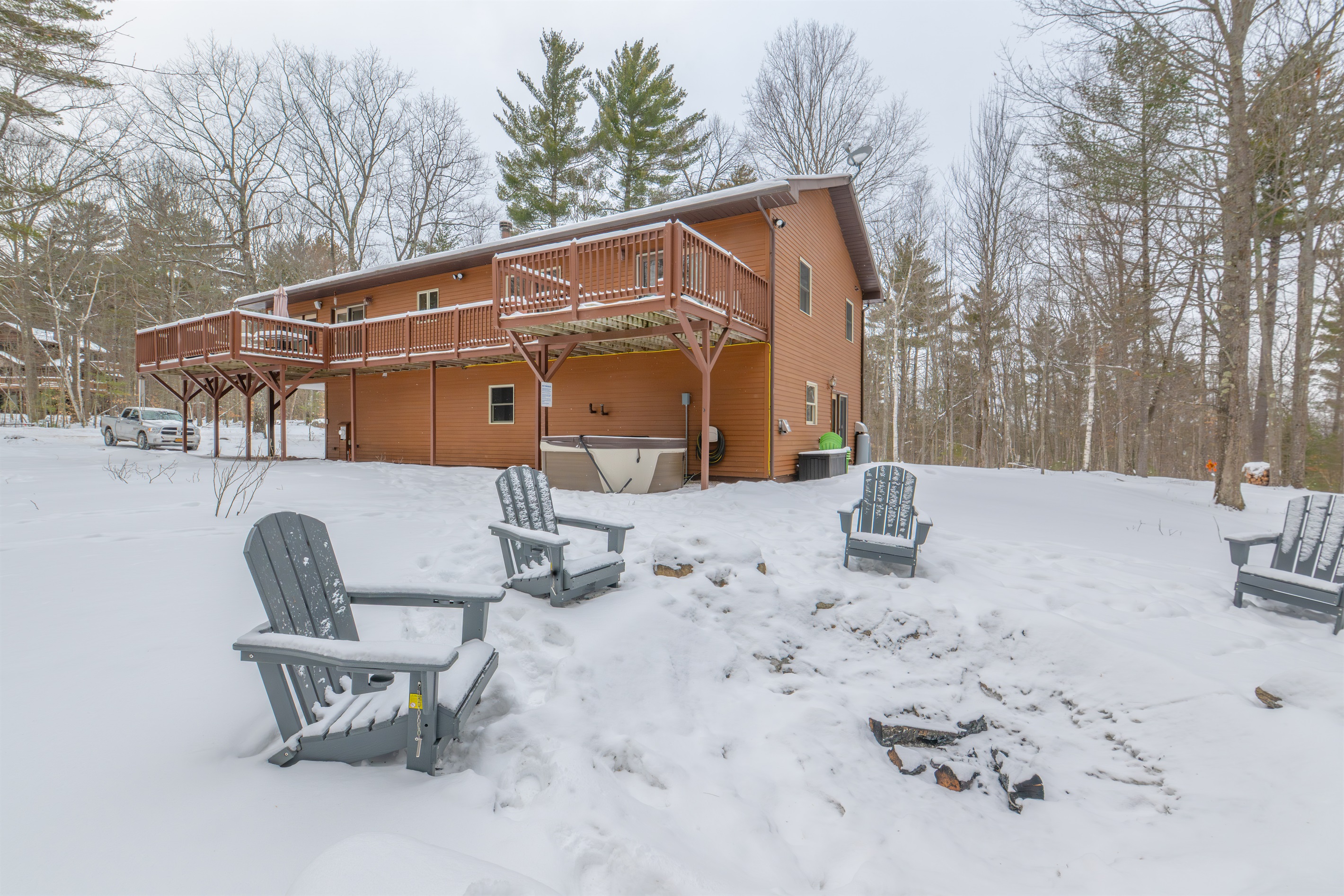 Enjoy some s'mores with our outdoor fire pit surrounded by Adirondack chairs!