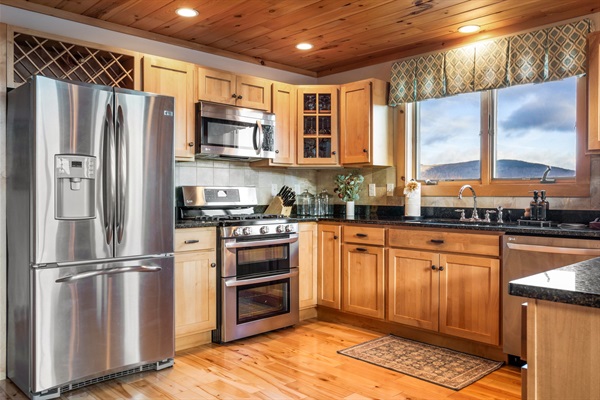 Cooking has never been so inviting—prepare and share your favorite dishes in this cozy space.