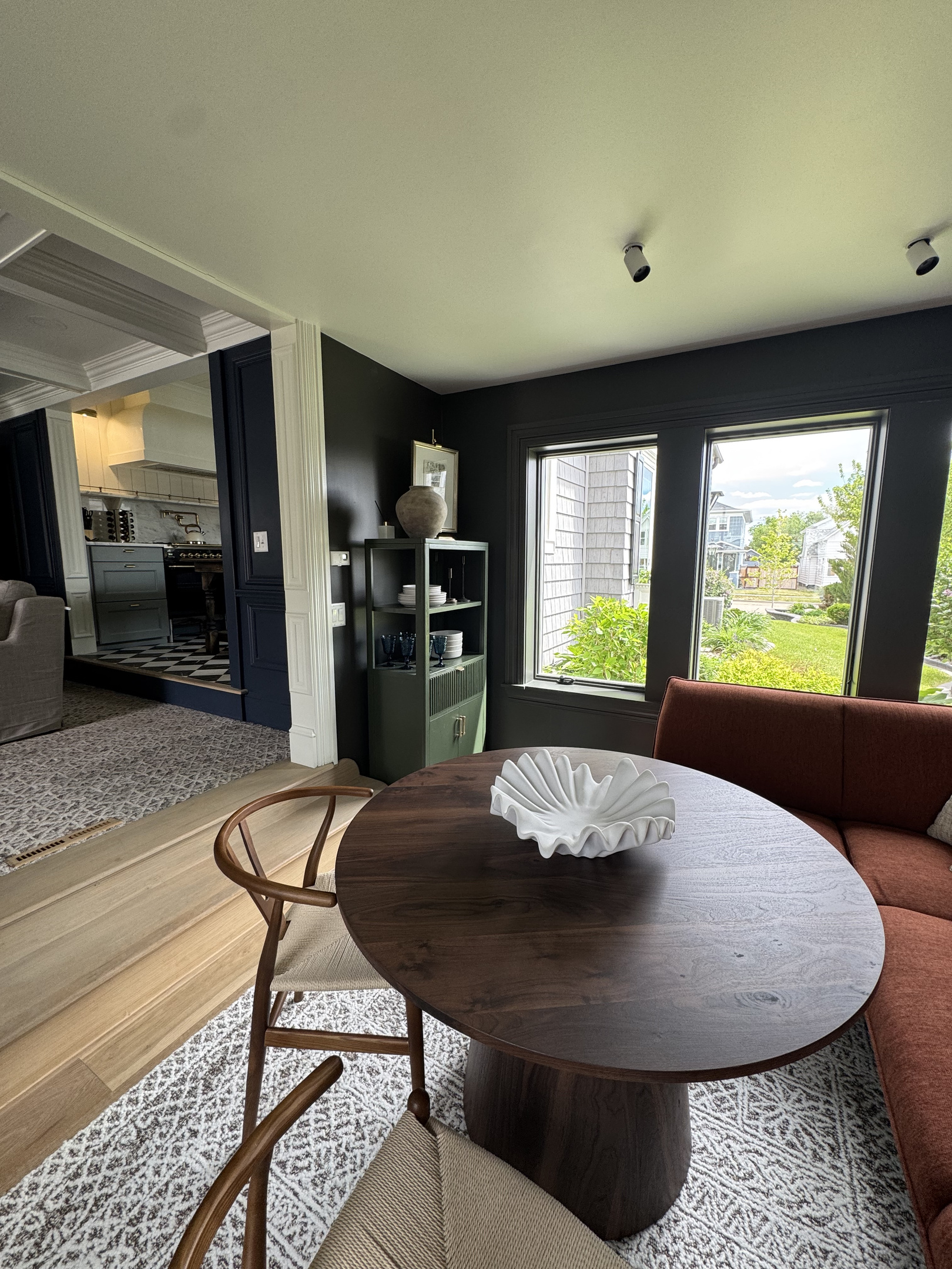 Perfect for morning coffee, family game nights, or casual meals, this cozy gathering space features comfortable seating, abundant natural light, and views of the backyard. A welcoming spot to connect, relax, and create lasting memories together.