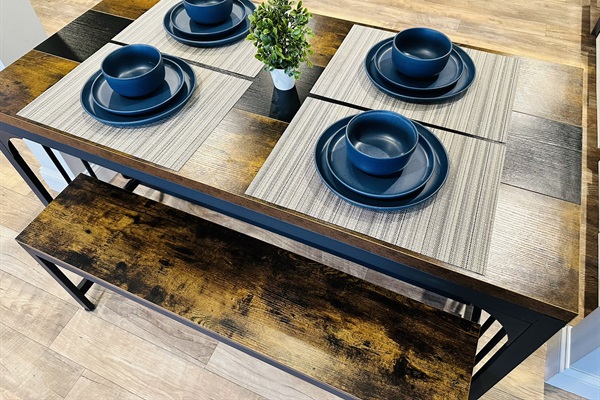 Dining table with space for four.