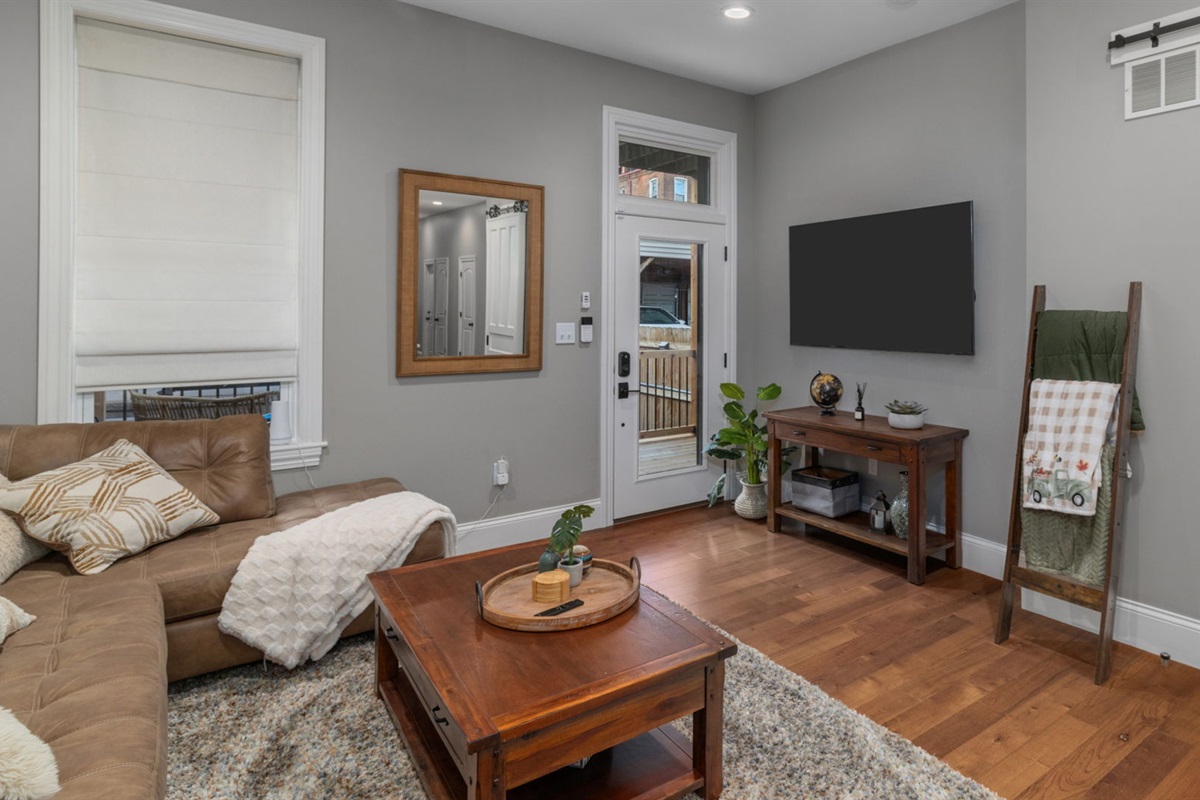 Relax and unwind in the family room which is equipped with a 55" Smart TV.