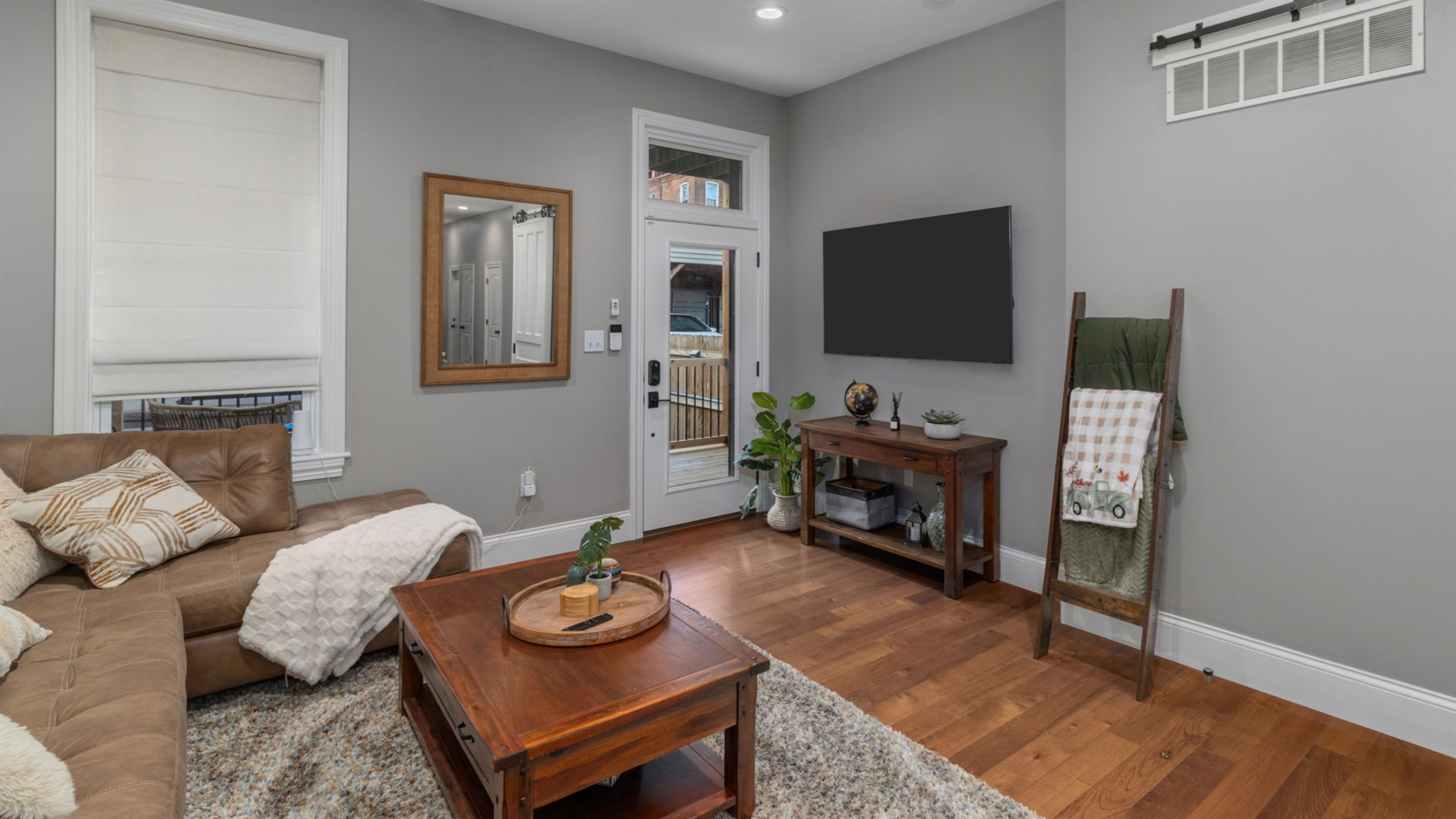 Relax and unwind in the family room which is equipped with a 55" Smart TV.