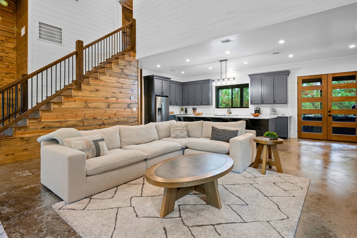 Large sectional and open floor plan create the perfect family space.