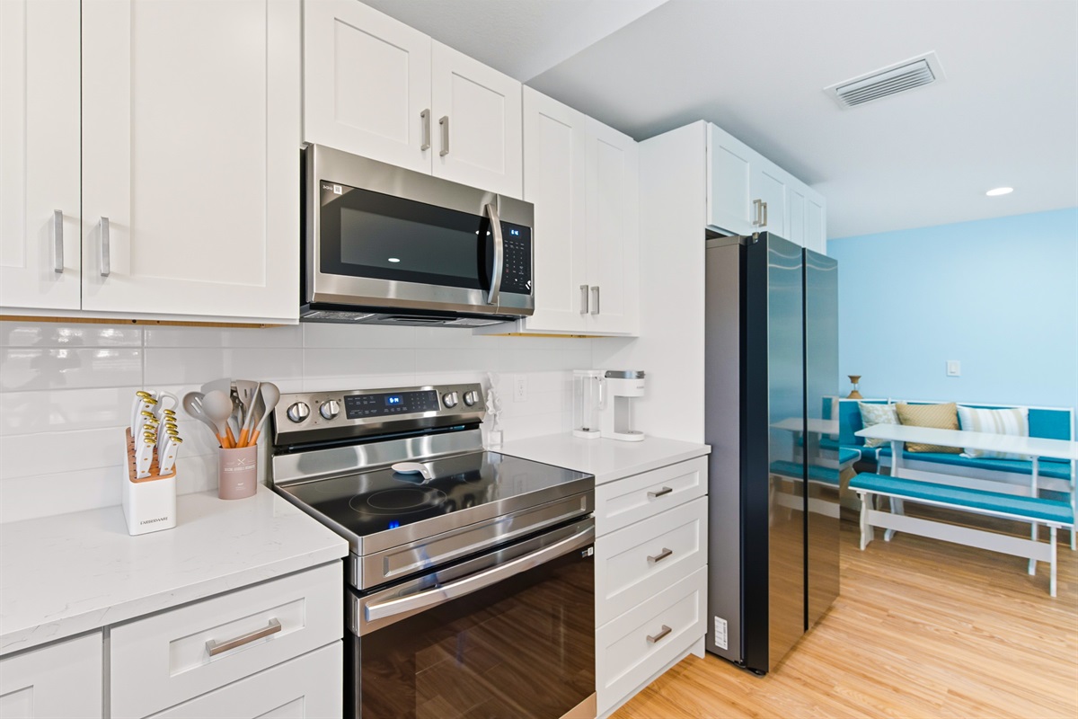 The kitchen is equipped with all guests need to prepare their own meals for enjoyment overlooking the water.