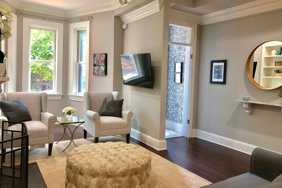 Enter into a warm, welcoming living space with thoughtful design, natural light, and timeless comfort waiting just beyond the front door.