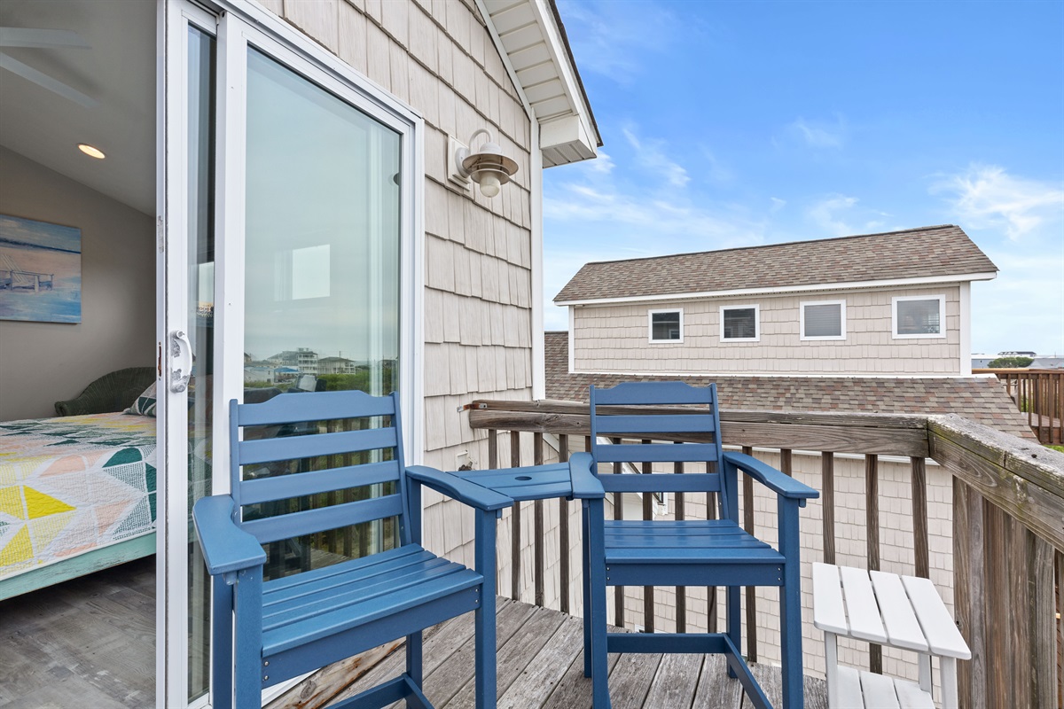 Direct bedroom access to a private balcony with elevated neighborhood views
