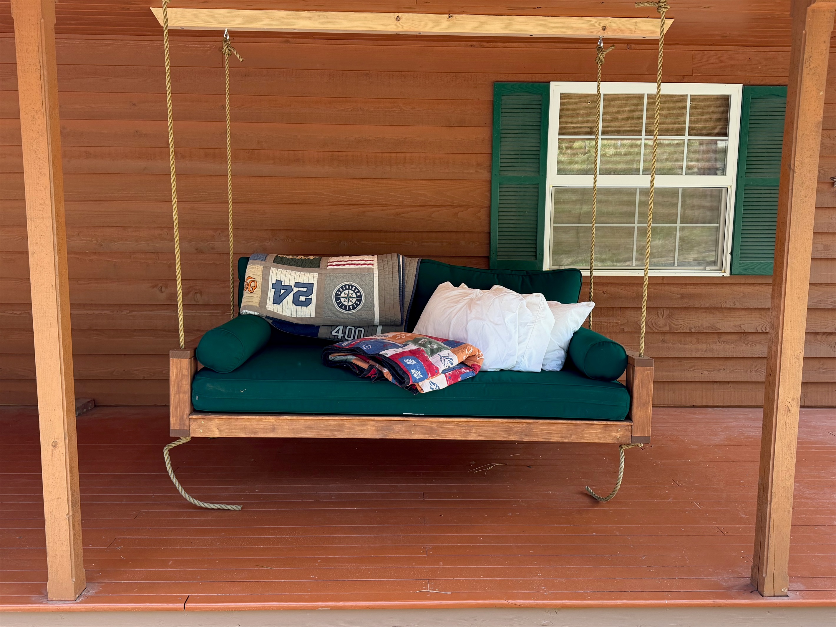 NEW! Swinging twin-sized daybed.  Enjoy a nap on the front covered porch, listen to the birds and relax outdoors.