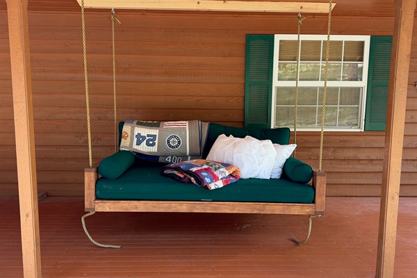 NEW! Swinging twin-sized daybed.  Enjoy a nap on the front covered porch, listen to the birds and relax outdoors.