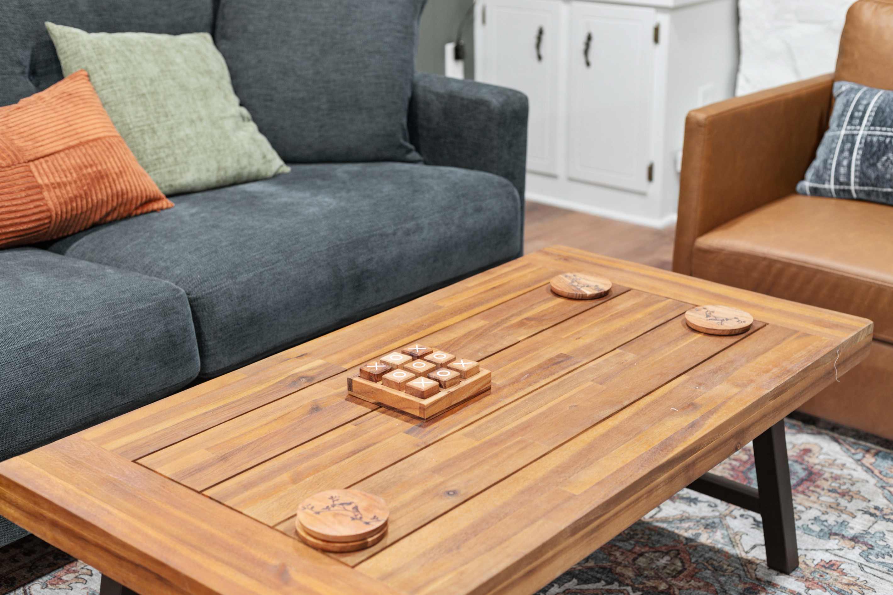 With plenty of comfy seating around the fireplace, it's the perfect spot for friends and family to gather, play games, or just relax together.