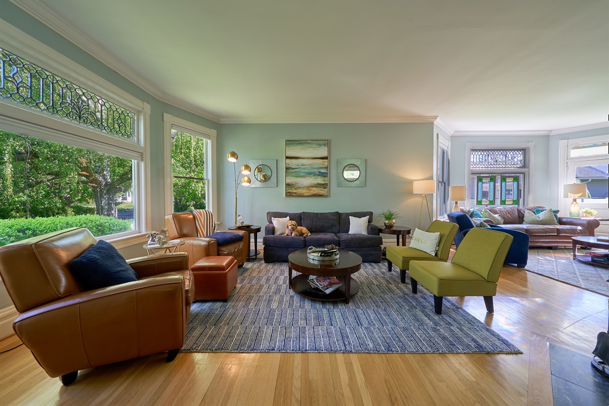 Great room with a wood burning fireplace (firewood provided)  perfect for lounging, and a pull-out couch for flexible sleeping arrangements.