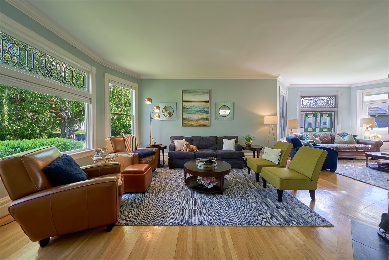 Great room with a wood burning fireplace (firewood provided)  perfect for lounging, and a pull-out couch for flexible sleeping arrangements.