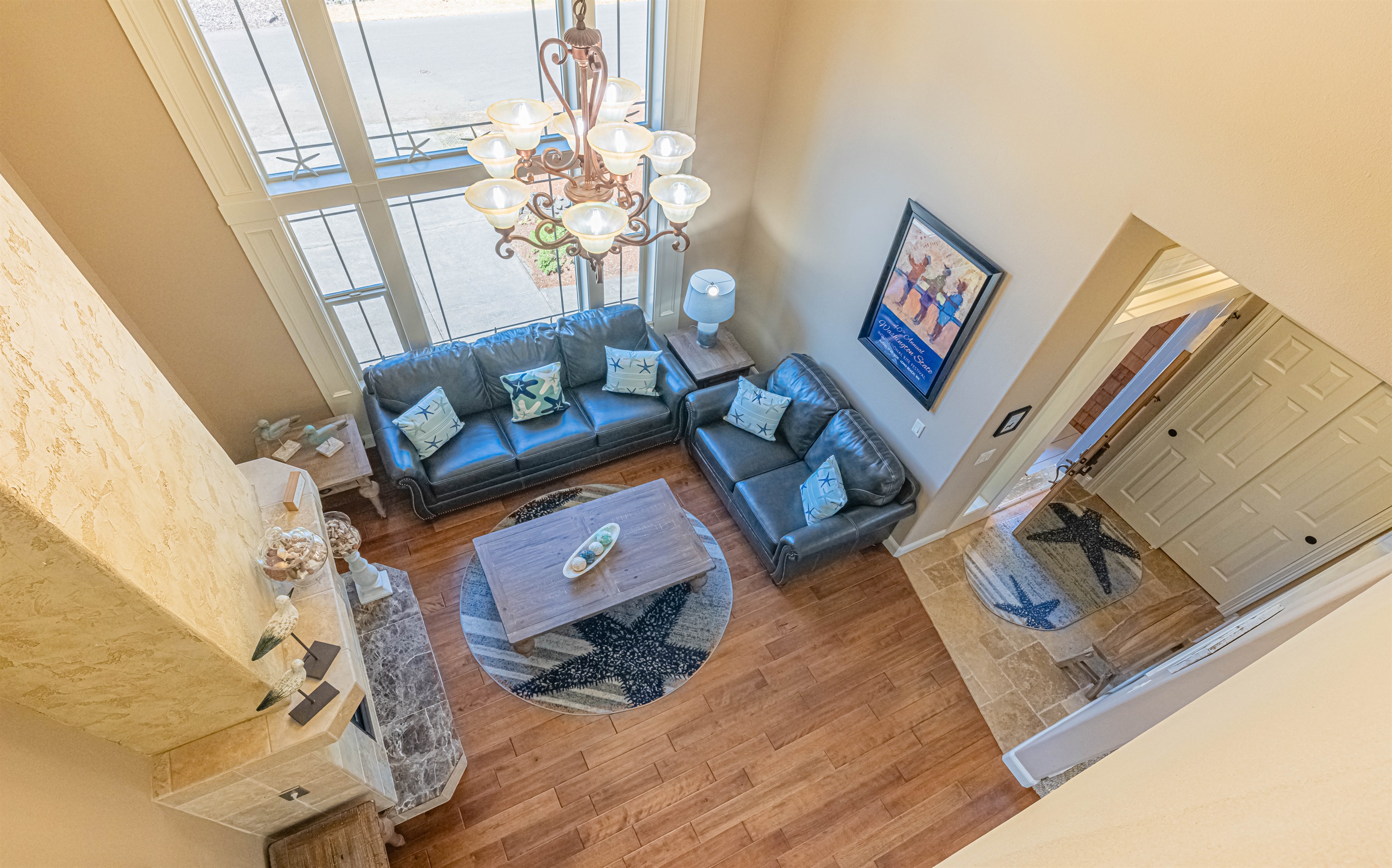 20 ft ceilings and a wall full of windows allows light to pour throughout the house.