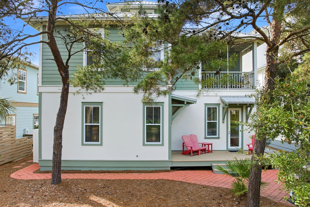 Immerse yourself in the lush, tropical scenery of Seacrest Beach neighborhood, where every stroll is surrounded by towering lush trees and coastal beauty.