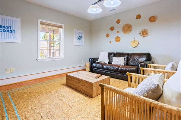 This is our basement living room—comfy, cozy, and waiting for you to settle in and make yourself at home!