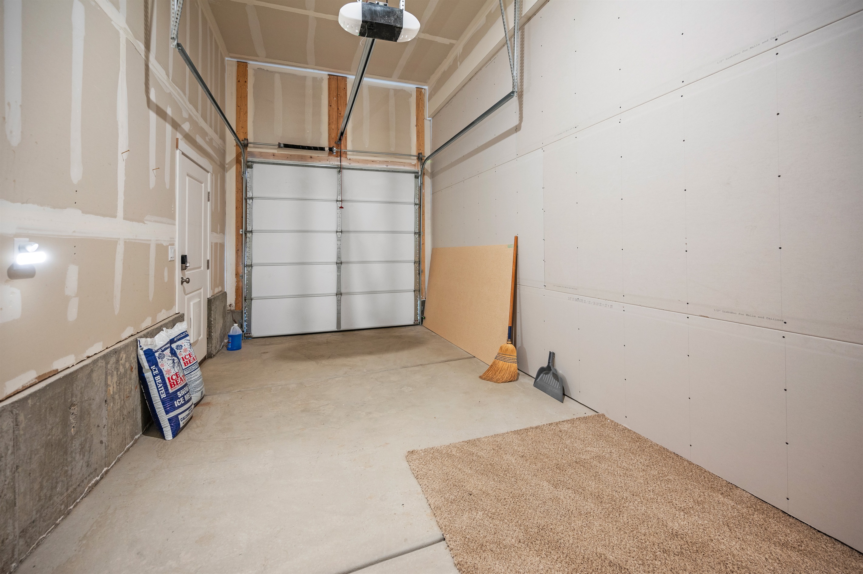 A dedicated one-car garage is available for downstairs guests, offering secure parking and easy access to the unit.