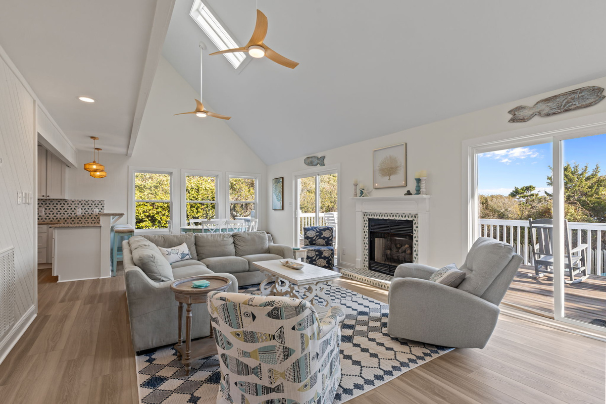 Coastal charm meets everyday comfort in this sun-filled space designed for slow mornings and laid-back evenings