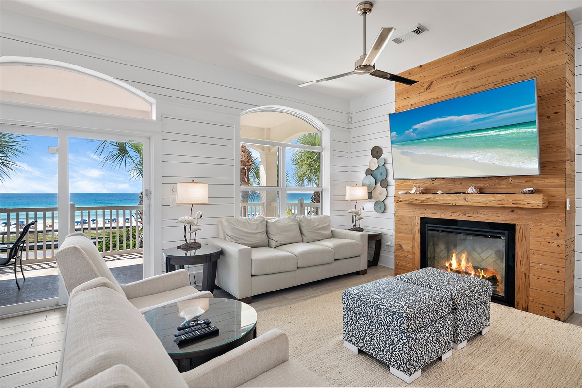 The Living Room features tons of comfortable seating, all new leather furniture, situated around a large Smart TV with incredible Gulf views - Come and Relax!