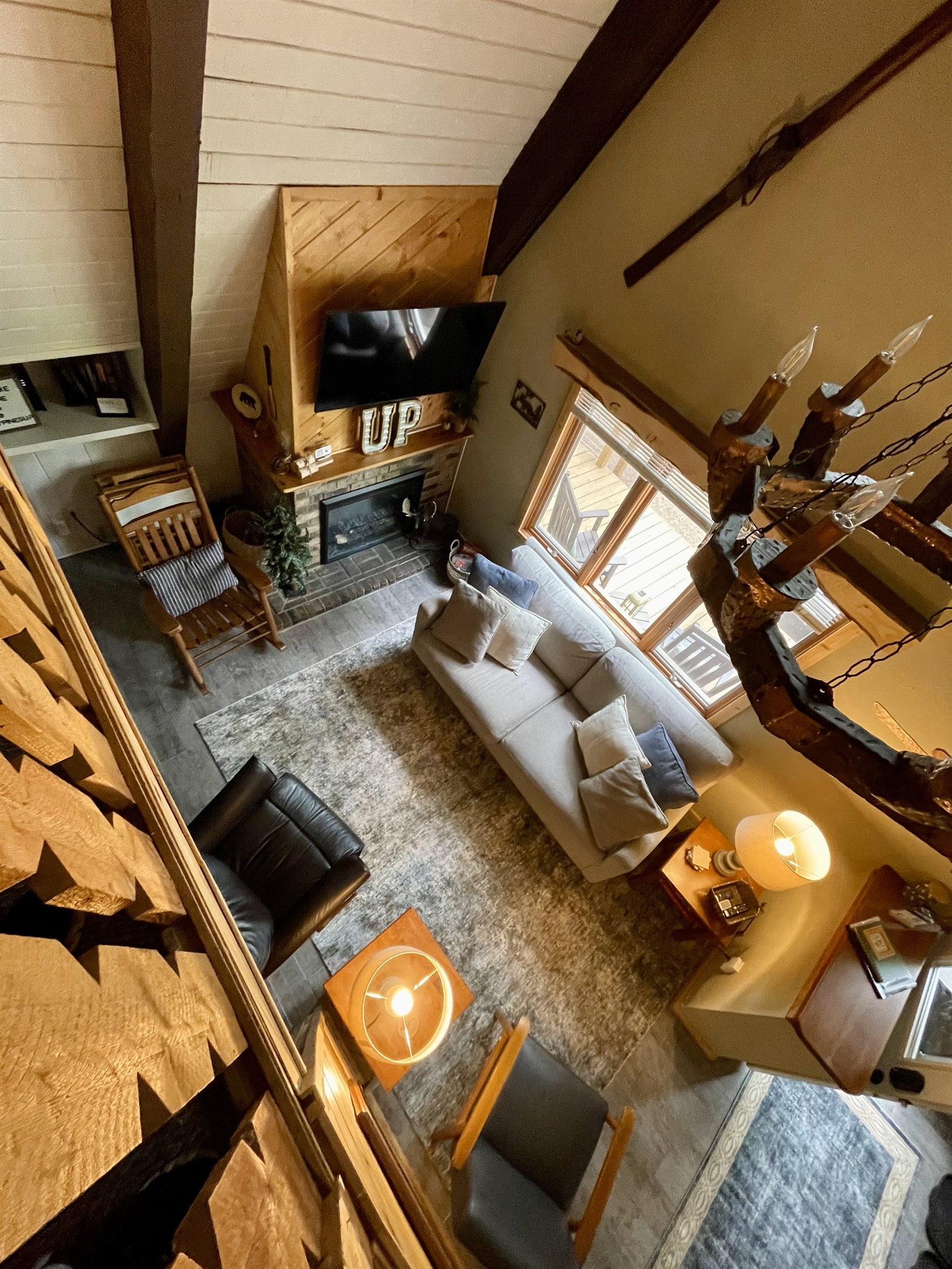There's nothing like an A-frame house for soaring ceilings and unique spaces.  Standing at the top of the stairs and looking out over the living room lets you really see why people love A-Frames.  