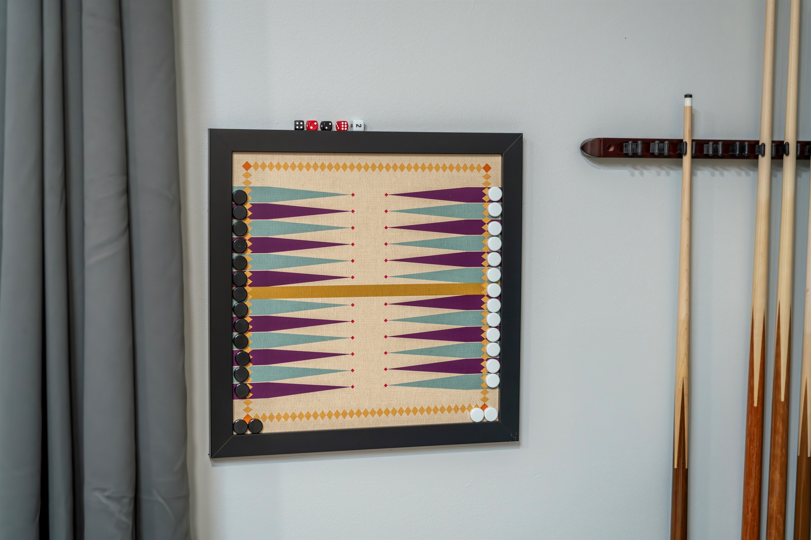 Backgammon, billiards, and vintage touches make this room a win for thinkers and sharpshooters alike