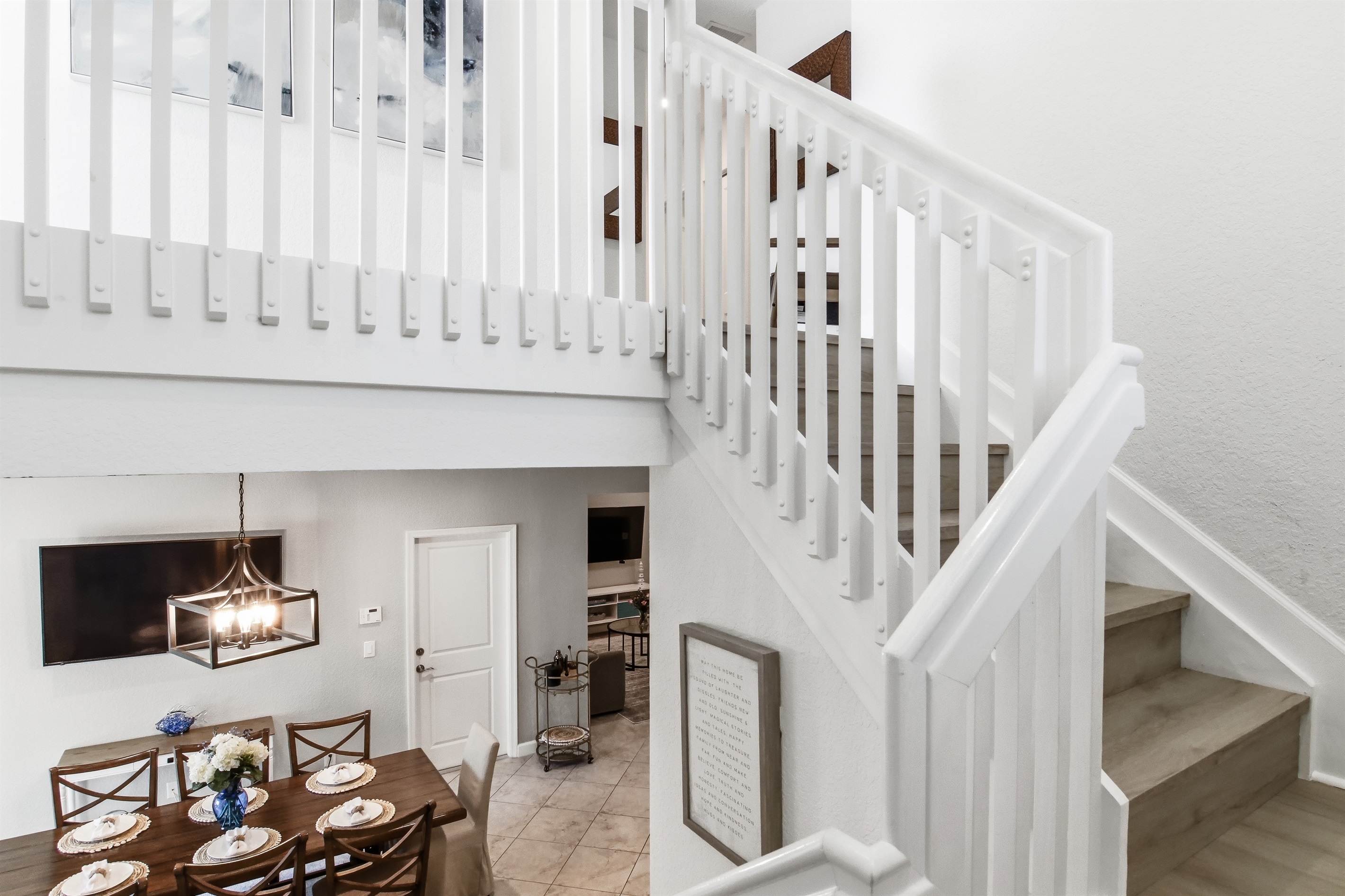 The second floor has 2 king bedrooms, 1 queen bedroom, 2 bathrooms, a laundry room and balcony access