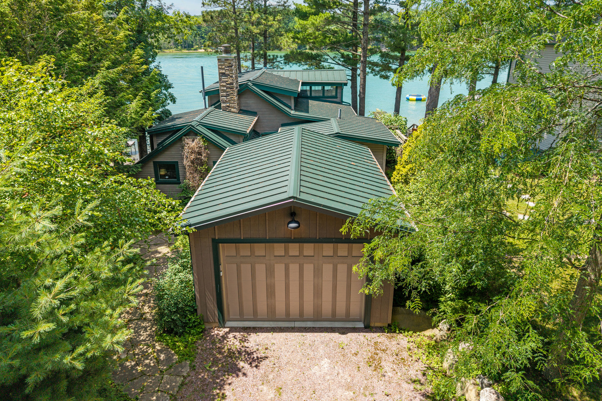 Two dedicated parking spaces are conveniently located right in front of the garage for easy access.