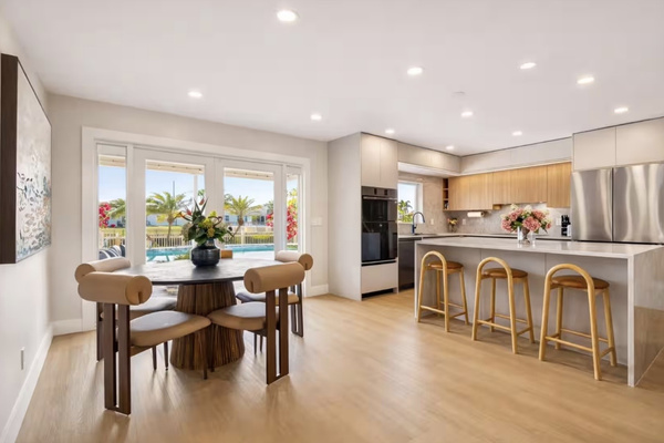 Open-concept living, dining and kitchen designed for gathering together