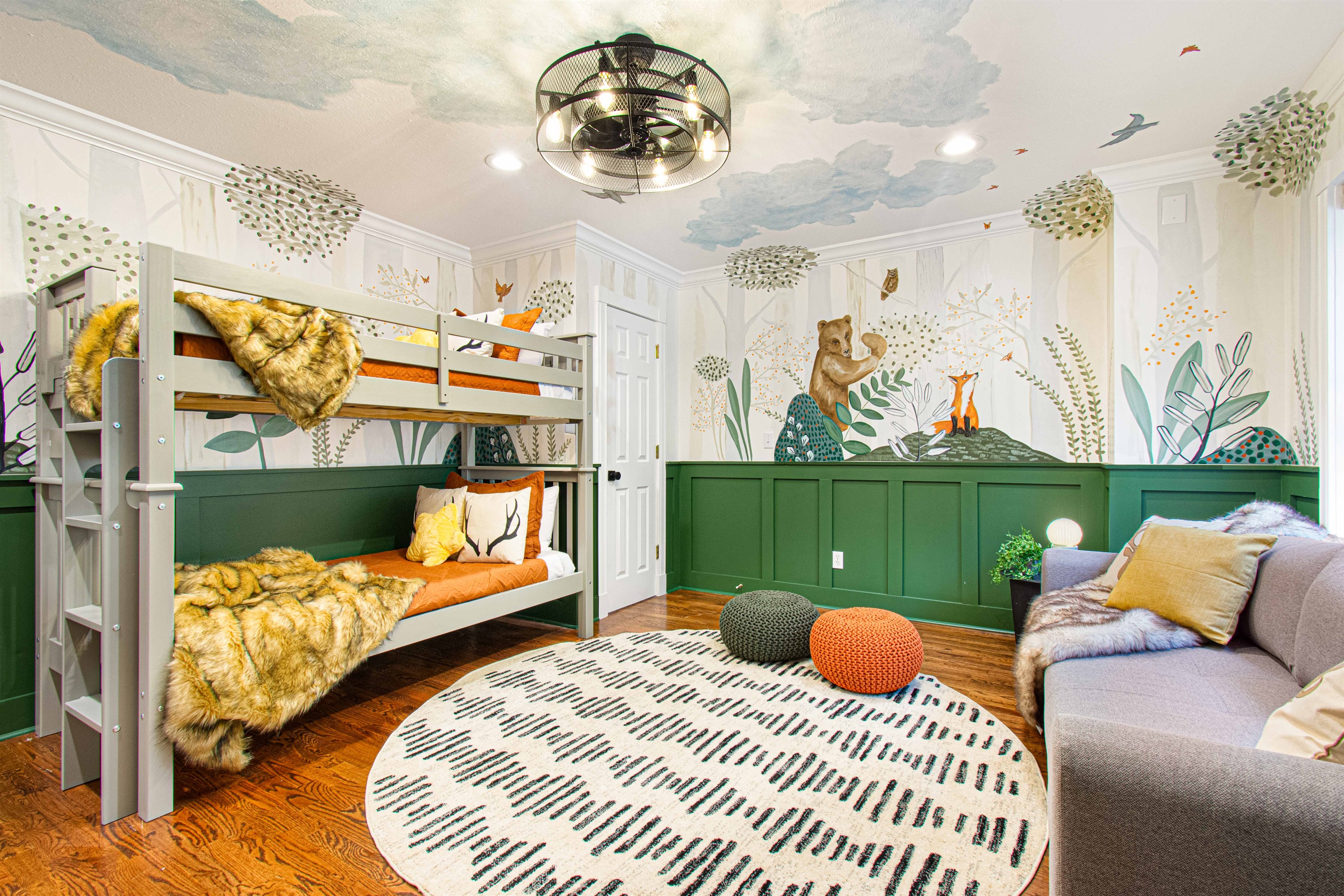 Welcome to the whimsical bunk room, featuring enchanting hand-painted animal murals! 🦁🎨 With a cozy twin over twin bunk, a full sleeper futon, and a dedicated workspace, it’s the perfect space for fun, creativity, and relaxation. Adventure awaits! 🌟🛏️