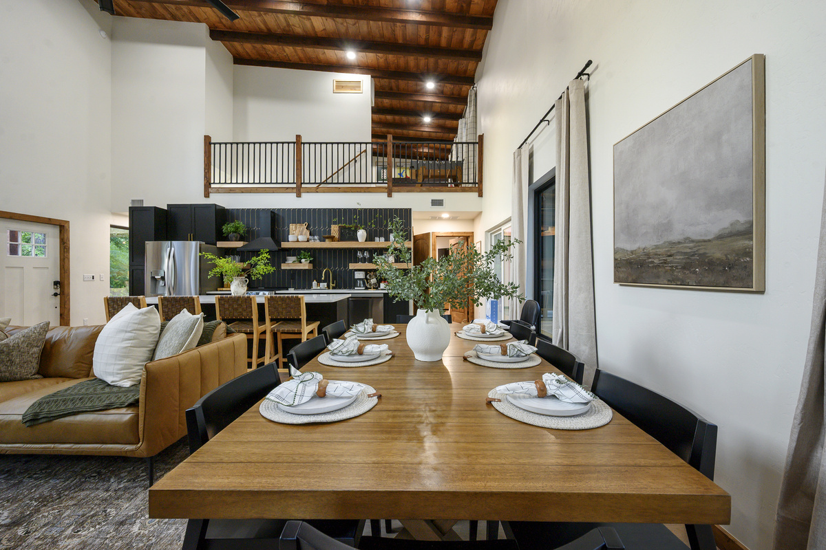 One space, everyone together. Gather around the dining table while the kitchen and living room stay part of the moment, whether it’s breakfast before a day outside or dinner that turns into hours around the table.
