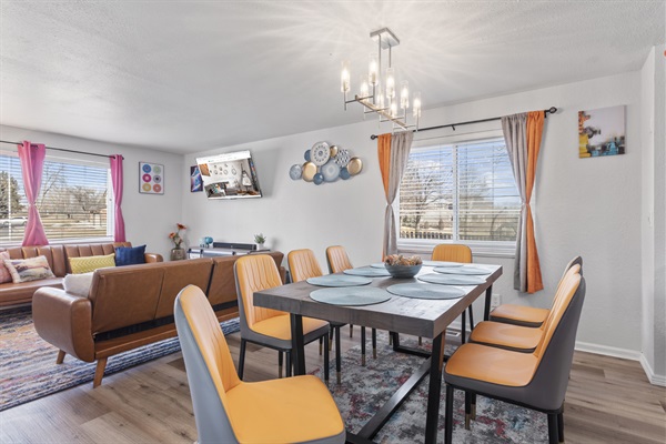 Gather around the 8-seater dining table for a feast!