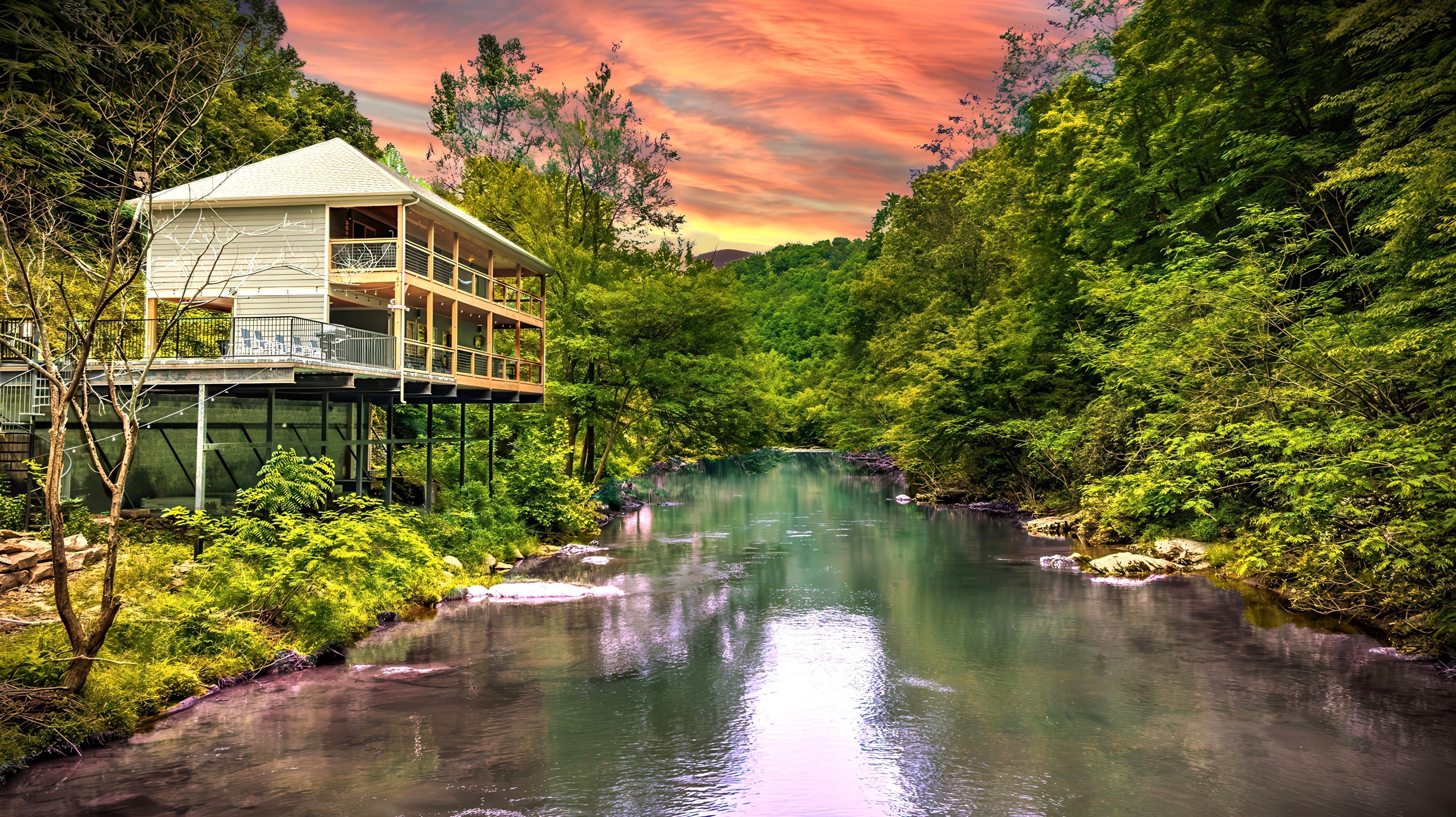 Welcome to "Take Me to the River" Cabin. Perched right above the famous "Little Pigeon River" in Gatlinburg. Enjoy coffee on the deck overlooking the river, watch wildlife pass through the trees, and take advantage of your private access to the river below