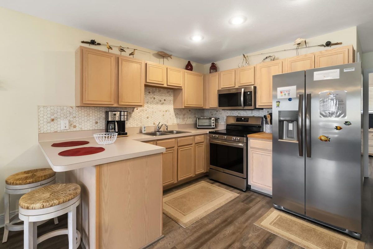 Cook a full family meal in the well-stocked kitchen &mdash; everything you need is already waiting.