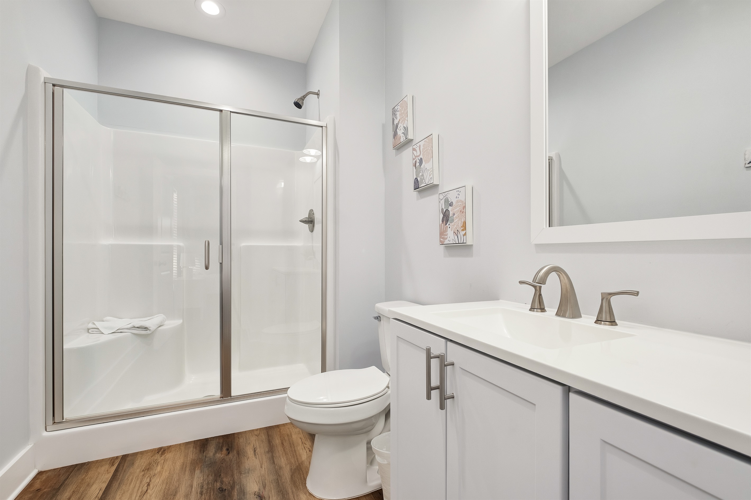 Bathroom #4 - Another inviting ensuite bathroom with a large walk-in shower.