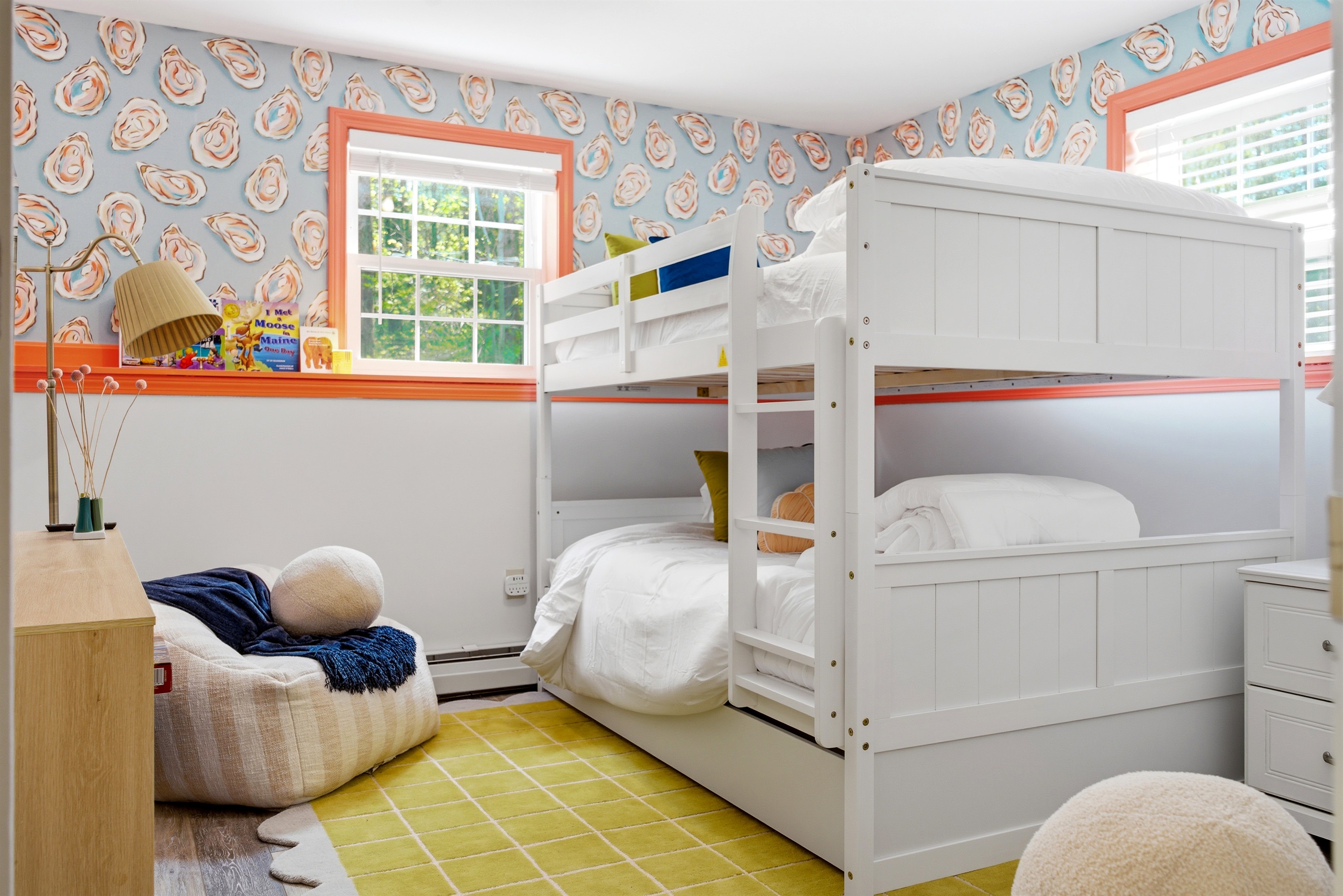 A sturdy and comfortable bunk bed featuring full-sized beds, designed to maximize space while offering a cozy and practical sleeping arrangement.