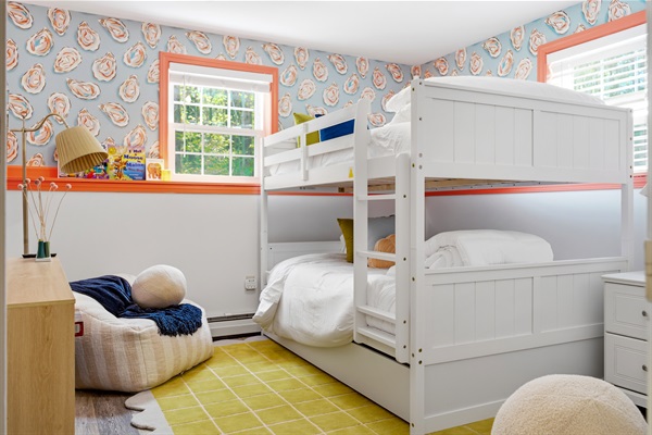 A sturdy and comfortable bunk bed featuring full-sized beds, designed to maximize space while offering a cozy and practical sleeping arrangement.